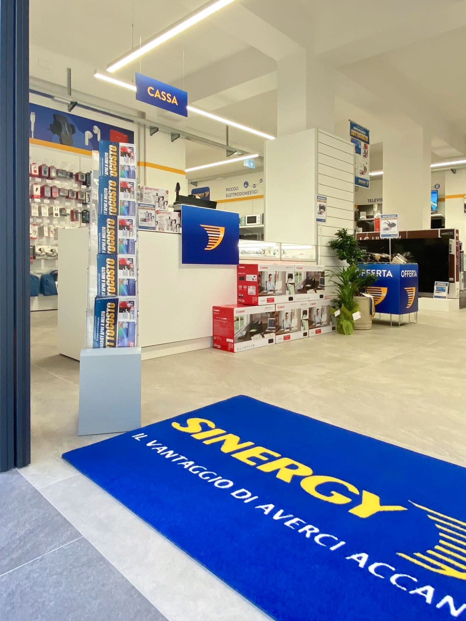 Progetto di arredo per Negozio Sinergy